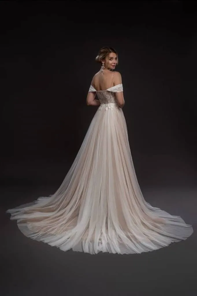 ---2022 cheap wedding dress made in tulle and lace with a sweetheart neckline, drooping lace straps and A line style skirt--