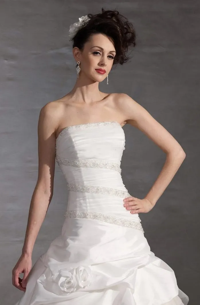 ---A-line-style wedding dress embellished with sequins and beads, semi-rigid bodice with straight neckline--