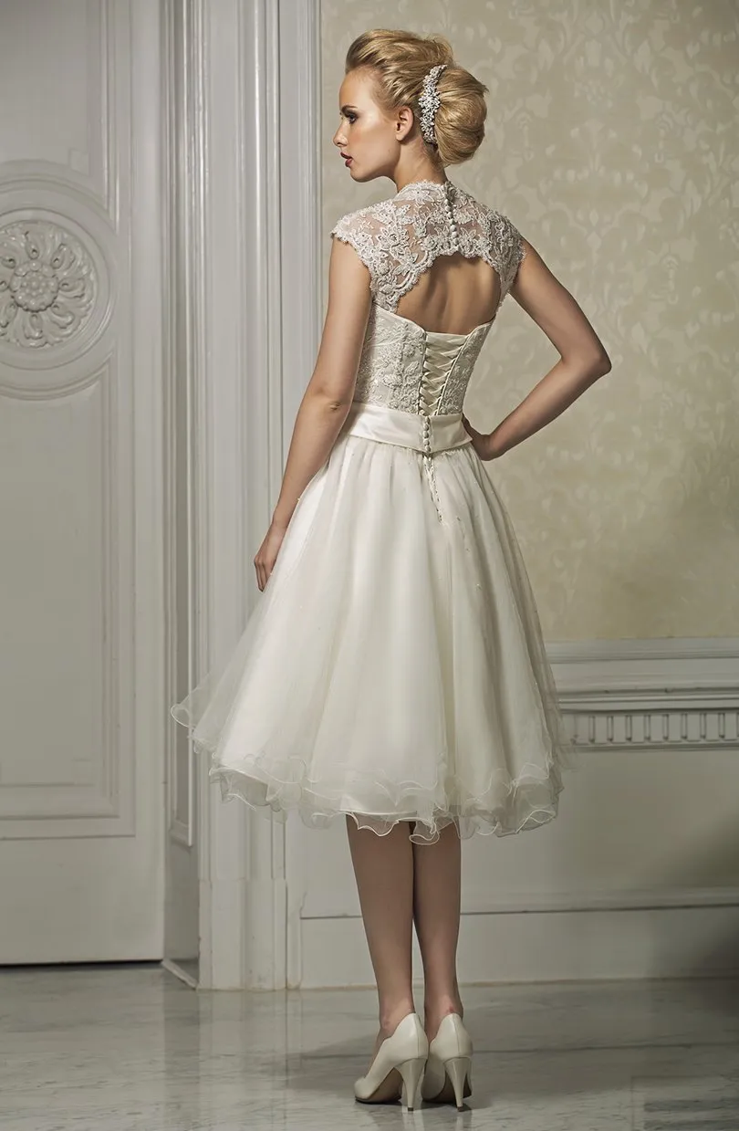 ---Catalog 2021 short wedding dress made of satin with lace appliqués and sparkles--