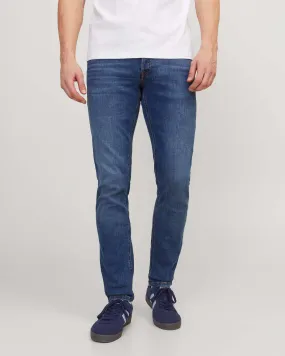 Jeans slim-fit a vita bassa in cotone stretch lavaggio medio stone washed con sabbiature