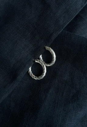 Orecchini a cerchio ovale in argento lavorato vintage anni ’70