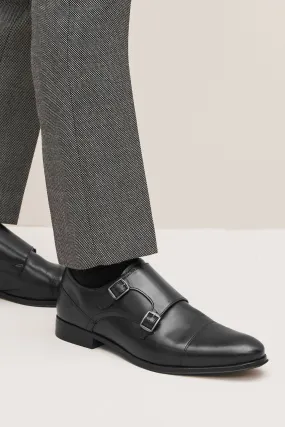 Scarpe in pelle con doppia fibbia