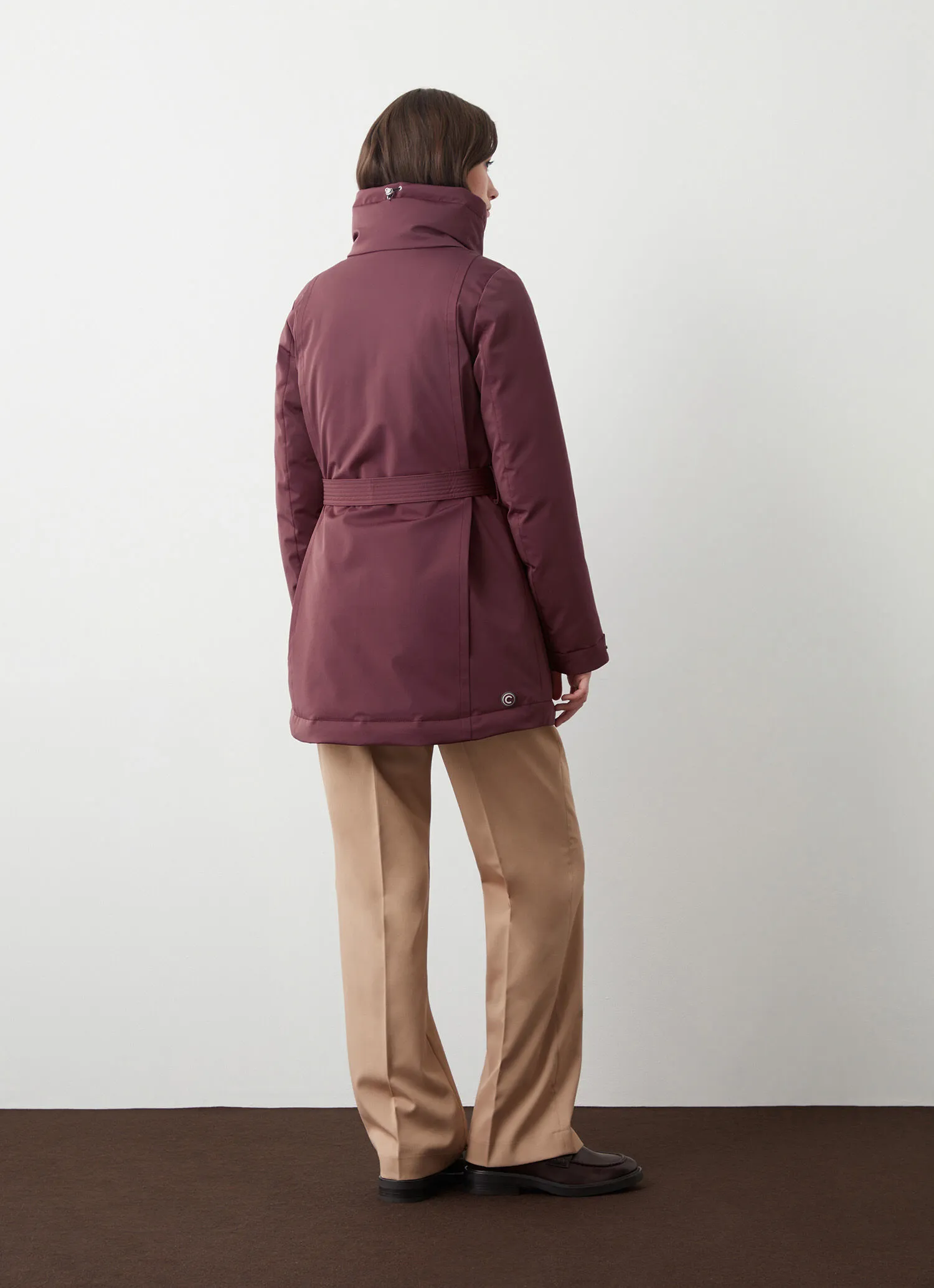 Waterproof fabric down jacket with belt